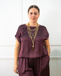 Blusa de raso satinado de mujer en berenjena